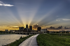 sun rays behind downtown Des Moines